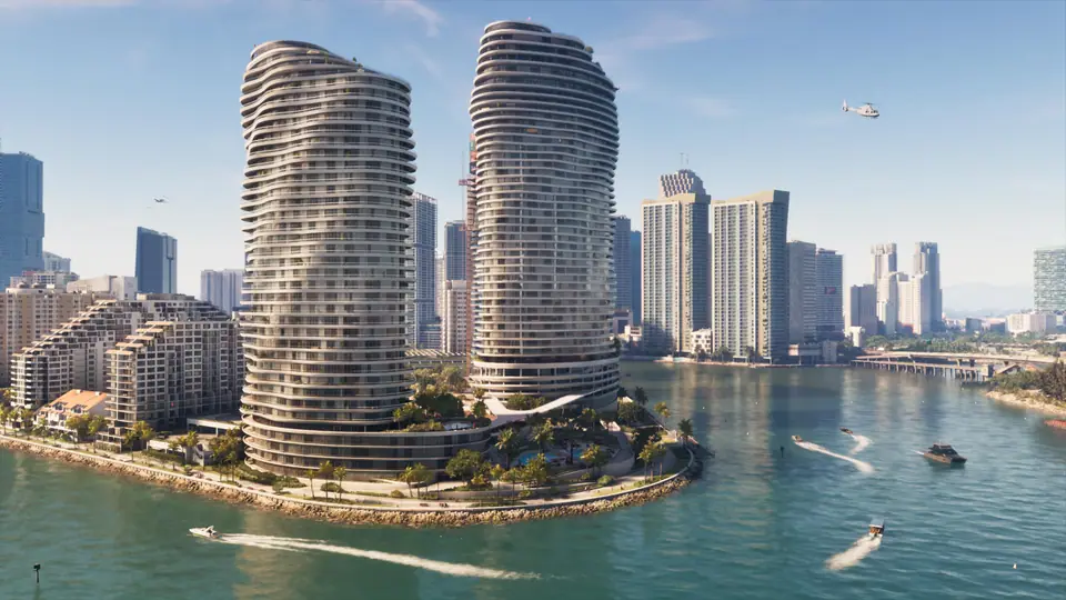 Dos torres residenciales curvas junto a una bahía con lanchas